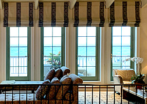 Multiple Soft Window Shades along Beach Front Windows